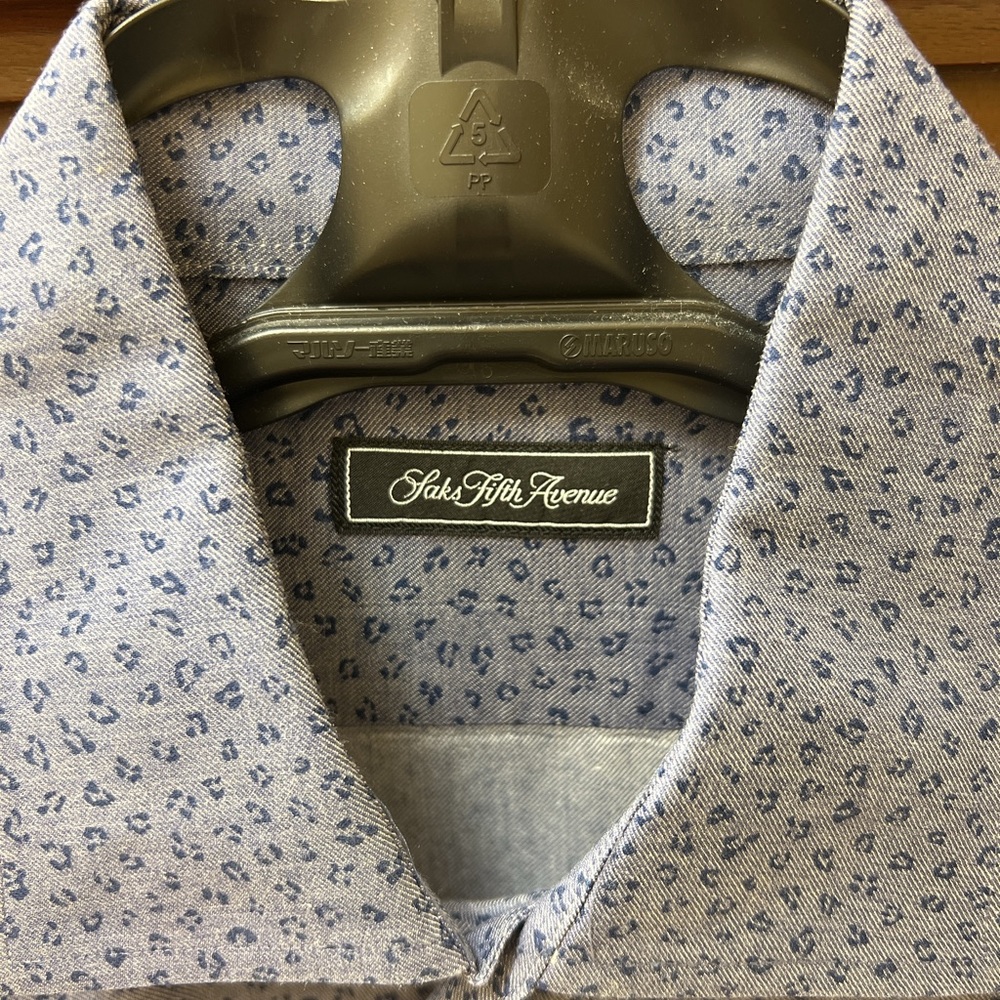 Saks LIKE NEW shirt, color is like the picture with the entire shirt showing.